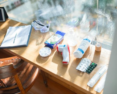 Sunlight streaming through a window onto a desk.